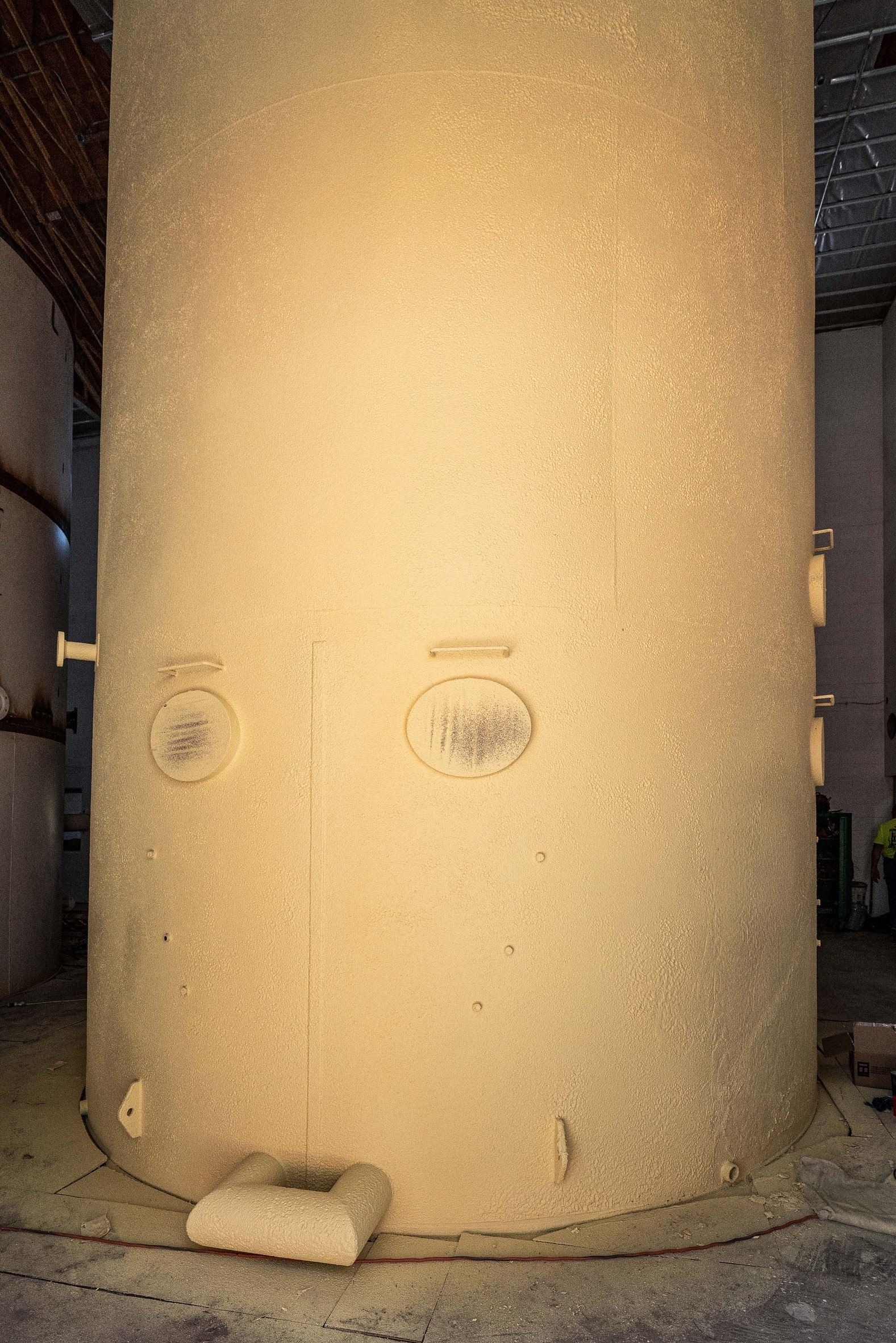 Insulation acrylic coating applied to Green Filter Tank Walls